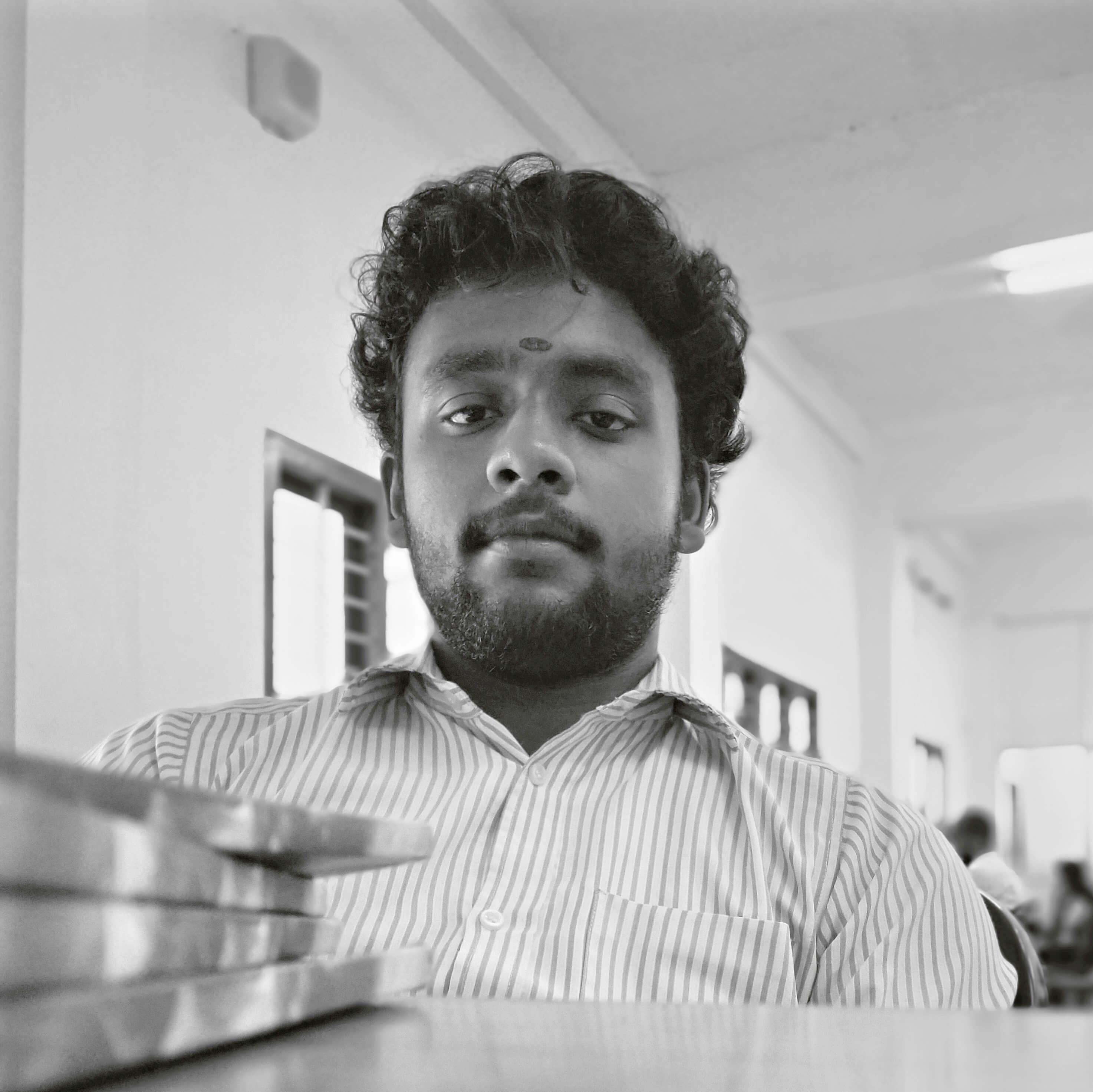 Arjun Krishna, in black and white